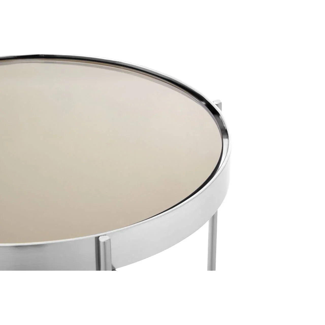 Round glass top side table with chrome frame, close-up of tabletop edge and legs