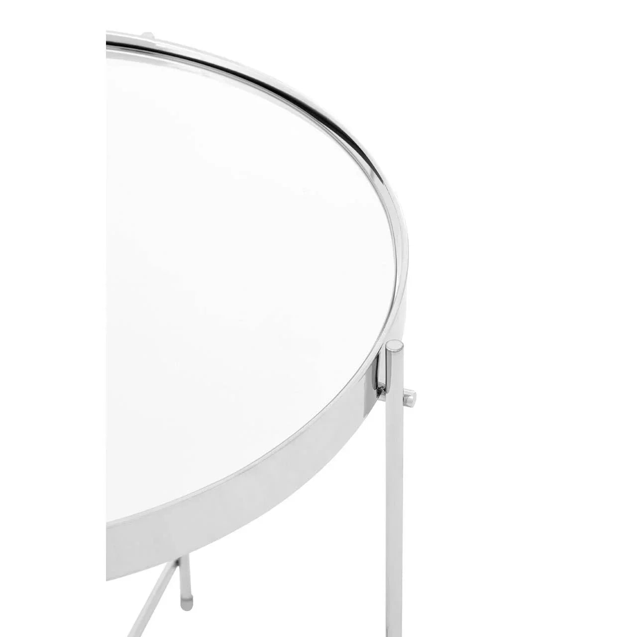 Round glass side table with chrome metal frame, close-up of tabletop and legs