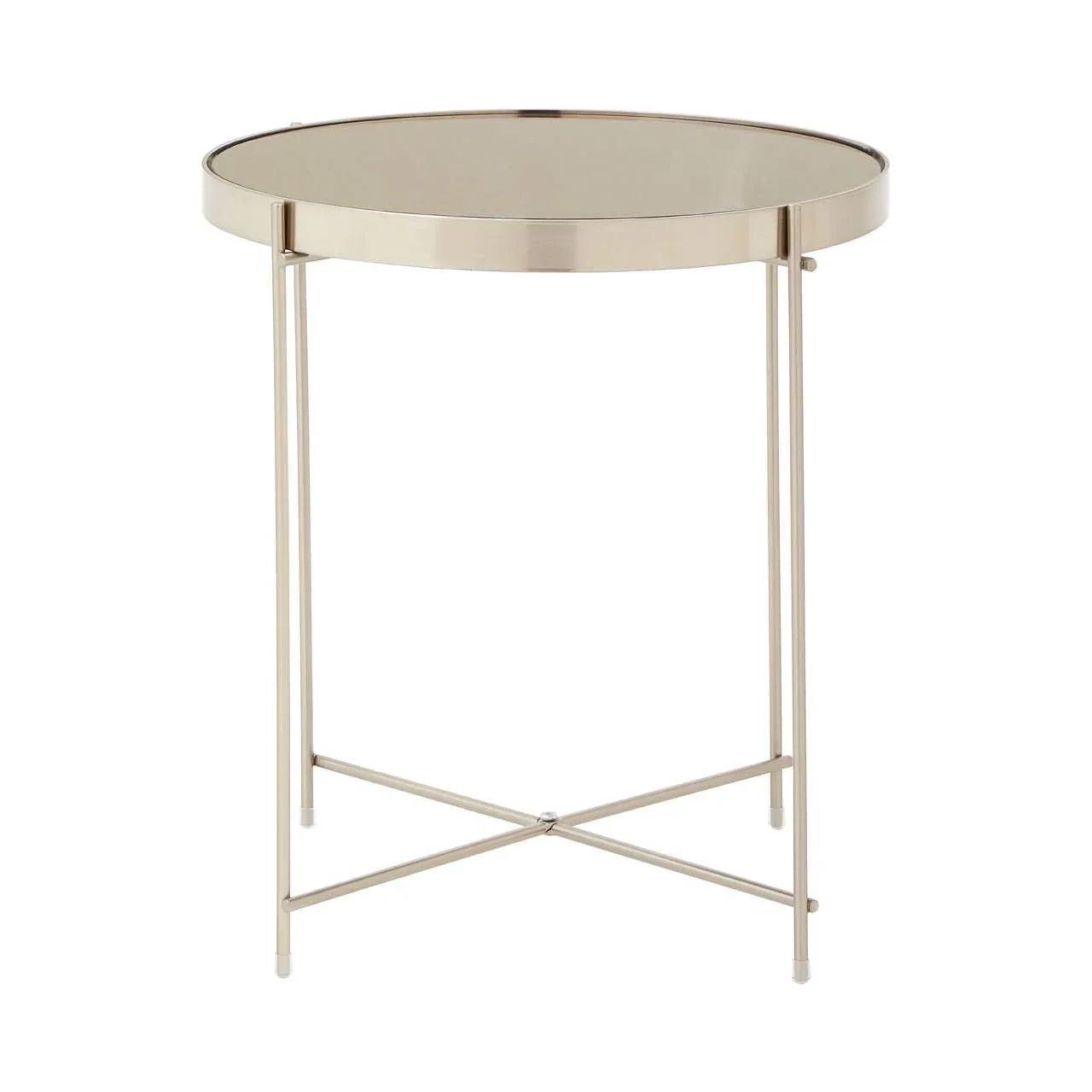 Round glass side table with gold metal frame and crossed base on white background