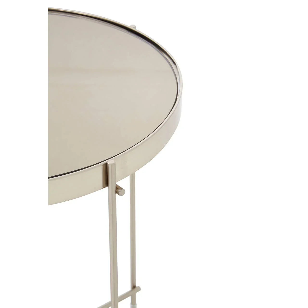 Round glass top side table with metallic frame, partial close-up view