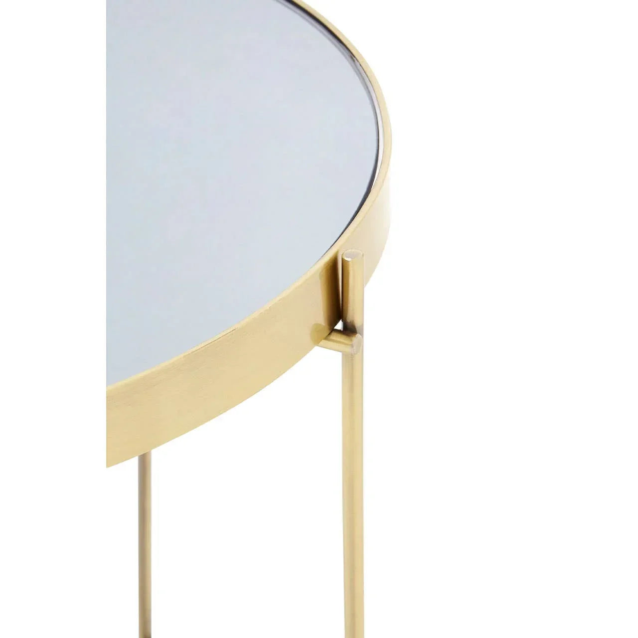 Round glass top side table with gold metal frame and slim modern legs, close up view