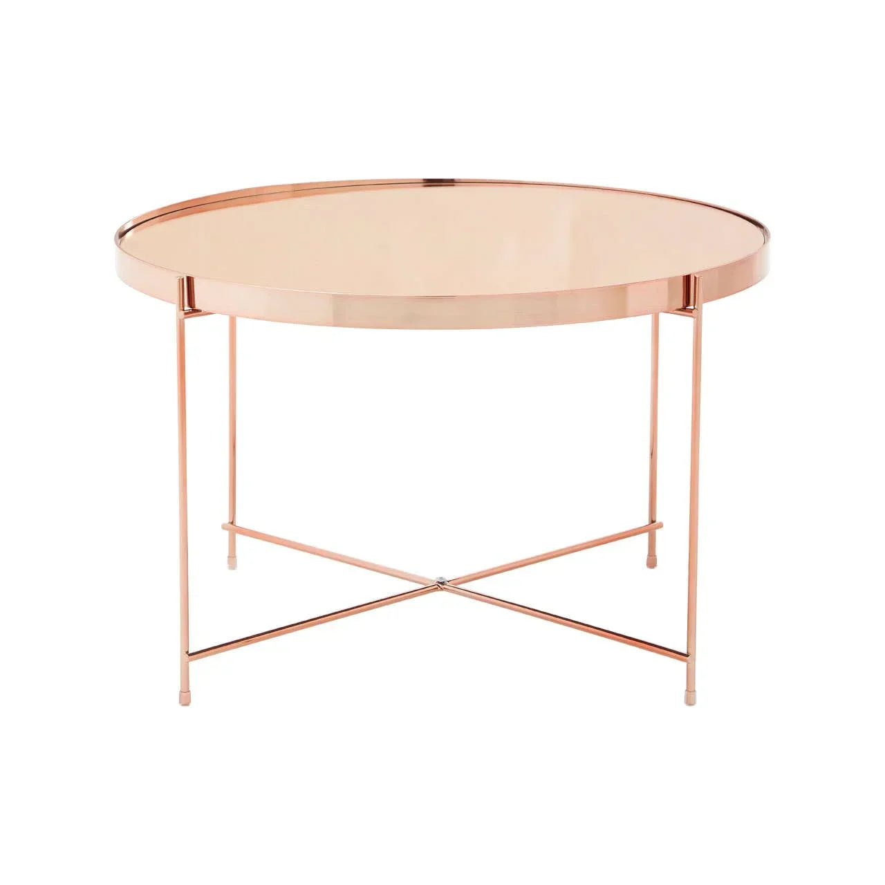 Round rose gold metal coffee table with mirrored top and slim crossed legs