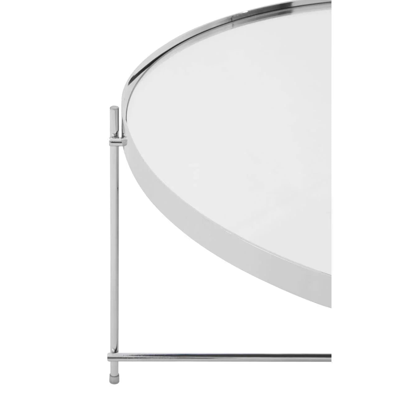 Round glass coffee table with chrome metal frame, close-up of tabletop and legs