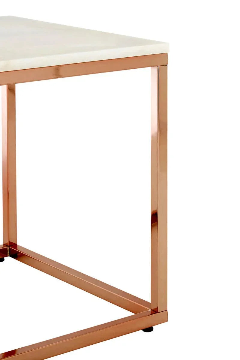 Side view of marble top table with copper metal frame and corner detail