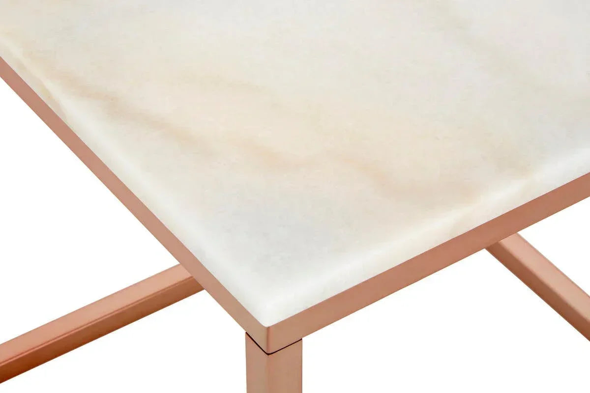 Rectangular marble top table with gold metal frame, close-up of corner and leg detail