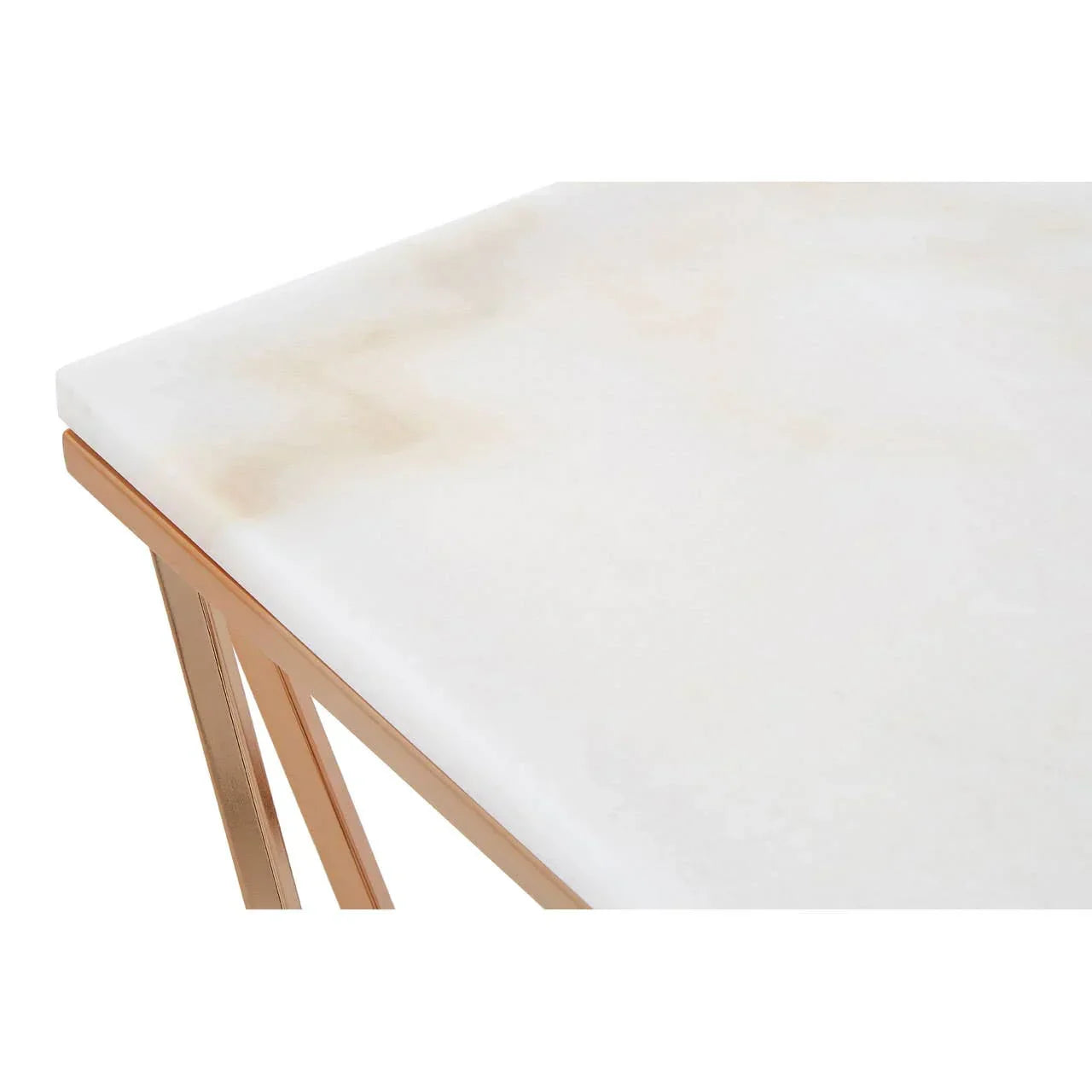 White marble table top with gold metal frame corner detail