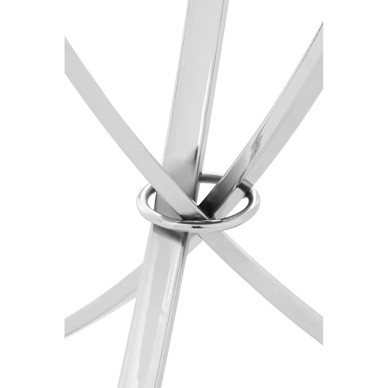 Chrome metal table legs with ring detail, close-up view of modern furniture base