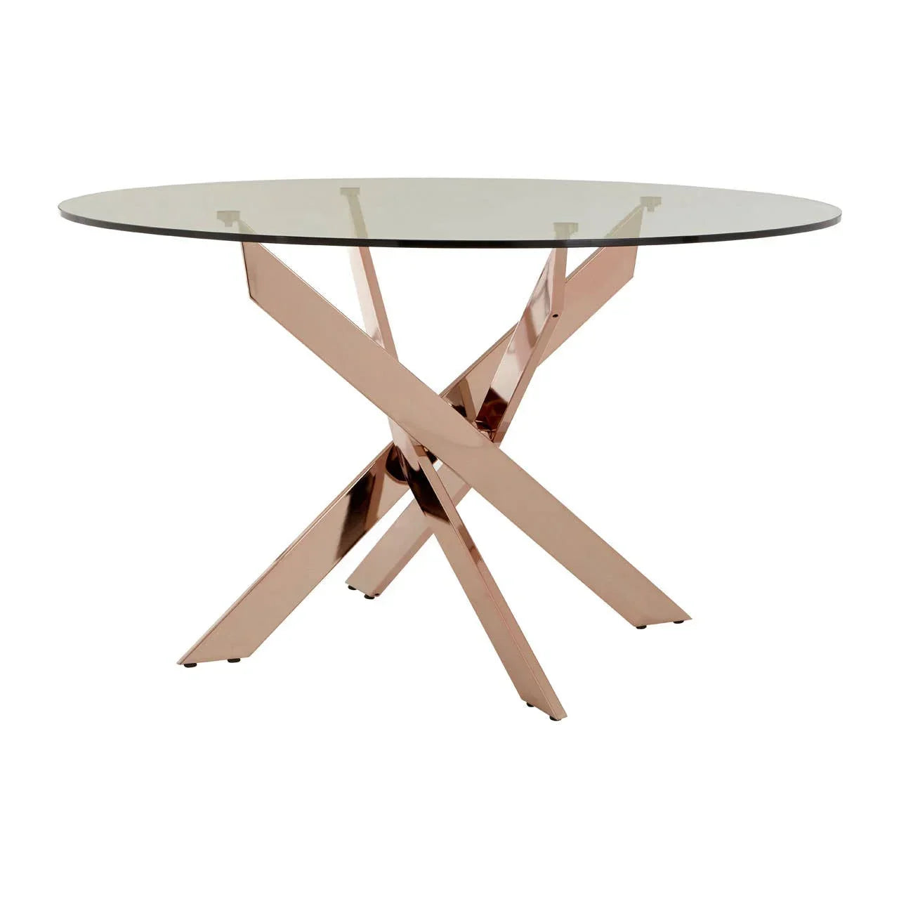 Round glass dining table with rose gold crossed metal base on white background