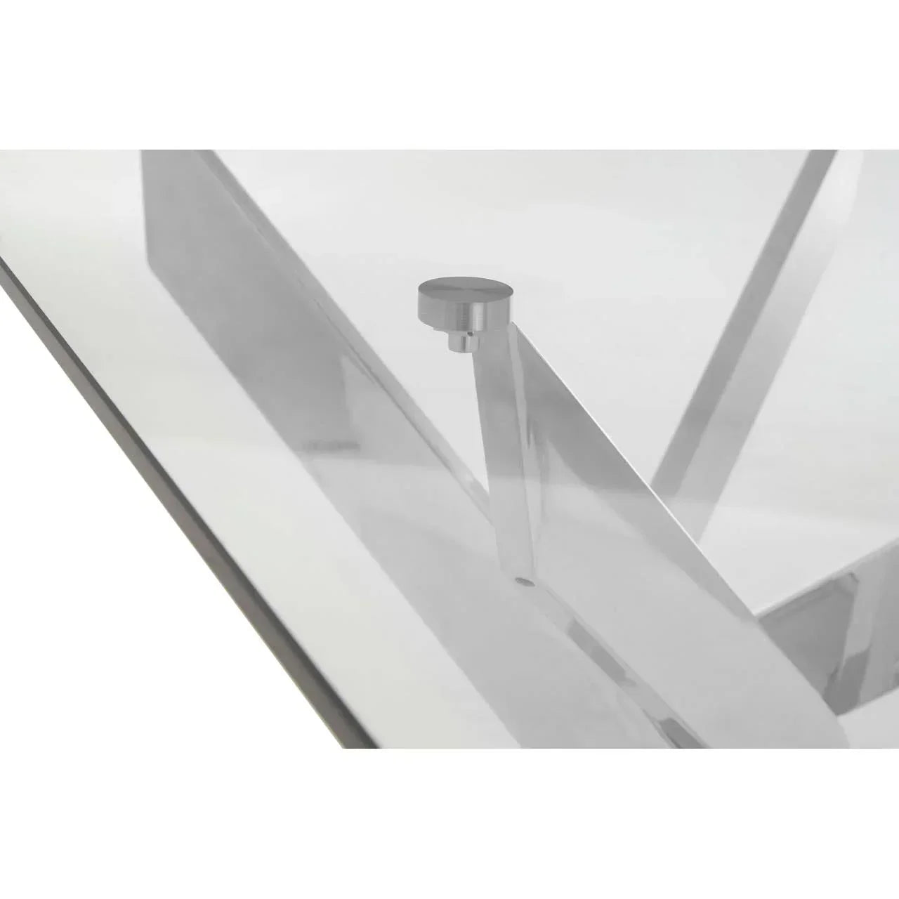Close-up of glass dining table corner with silver metal base and support
