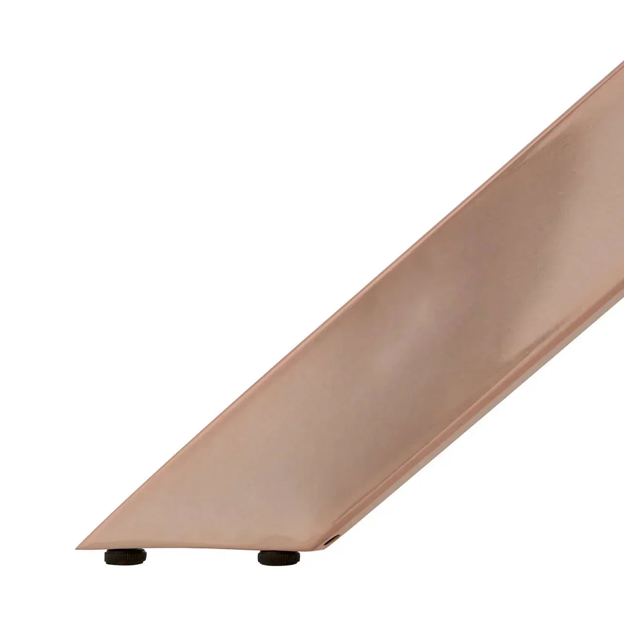 Close-up of angled rose gold metal furniture leg with protective floor pads