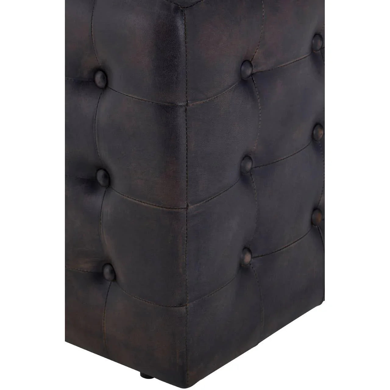 Close view of dark brown leather ottoman with deep button-tufted upholstery