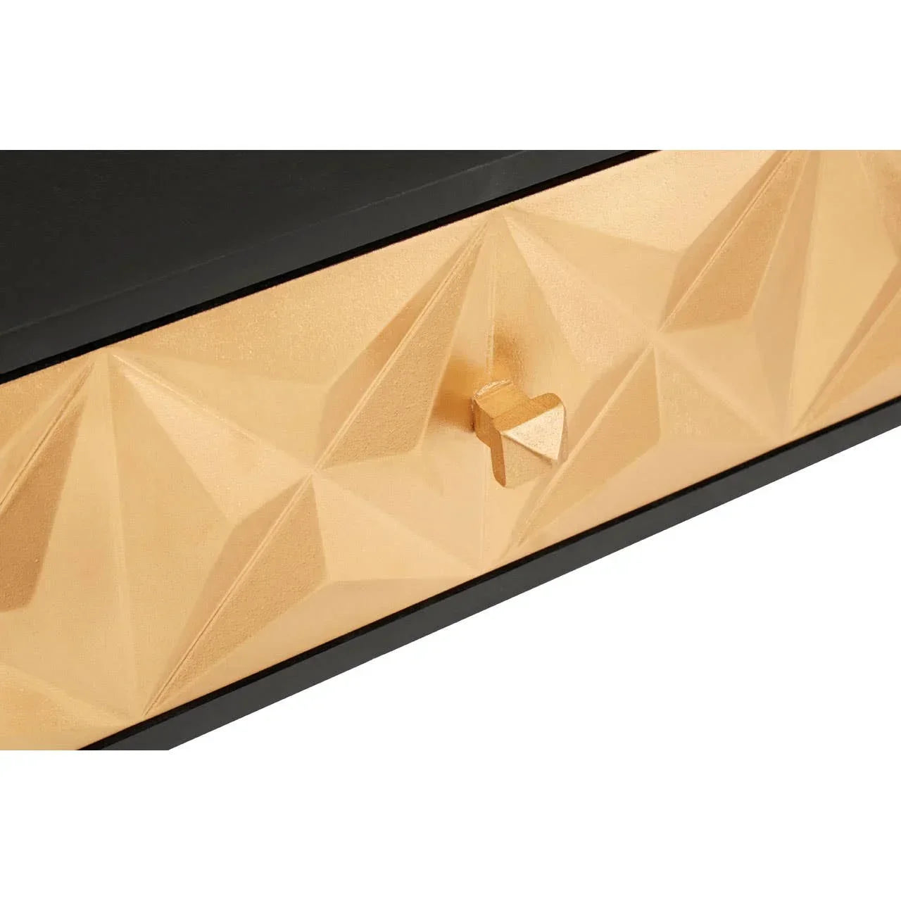 Gold geometric drawer front with textured pattern and metal handle, close-up view