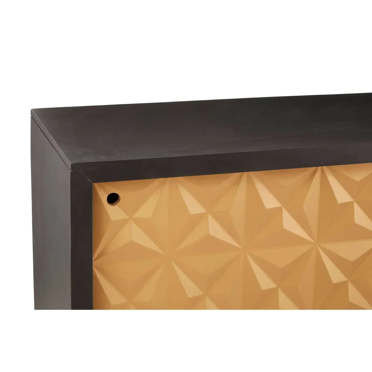 Close-up of geometric sideboard with black top and textured gold diamond pattern doors