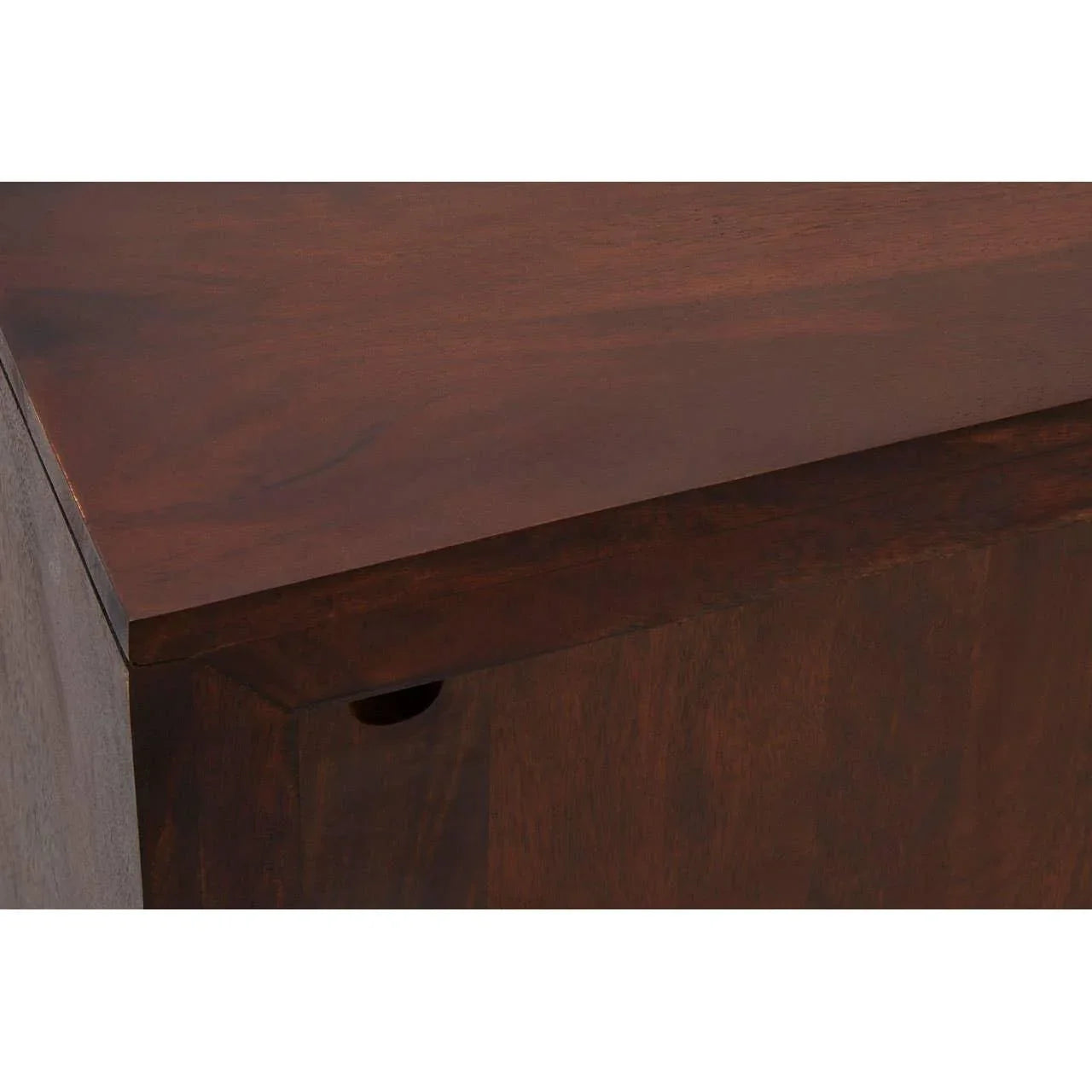 Closeup of dark wood furniture corner showing smooth surface and grain detail