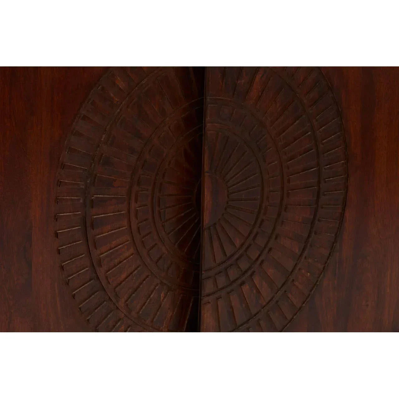 Close-up of carved solid wood cabinet doors with circular geometric pattern