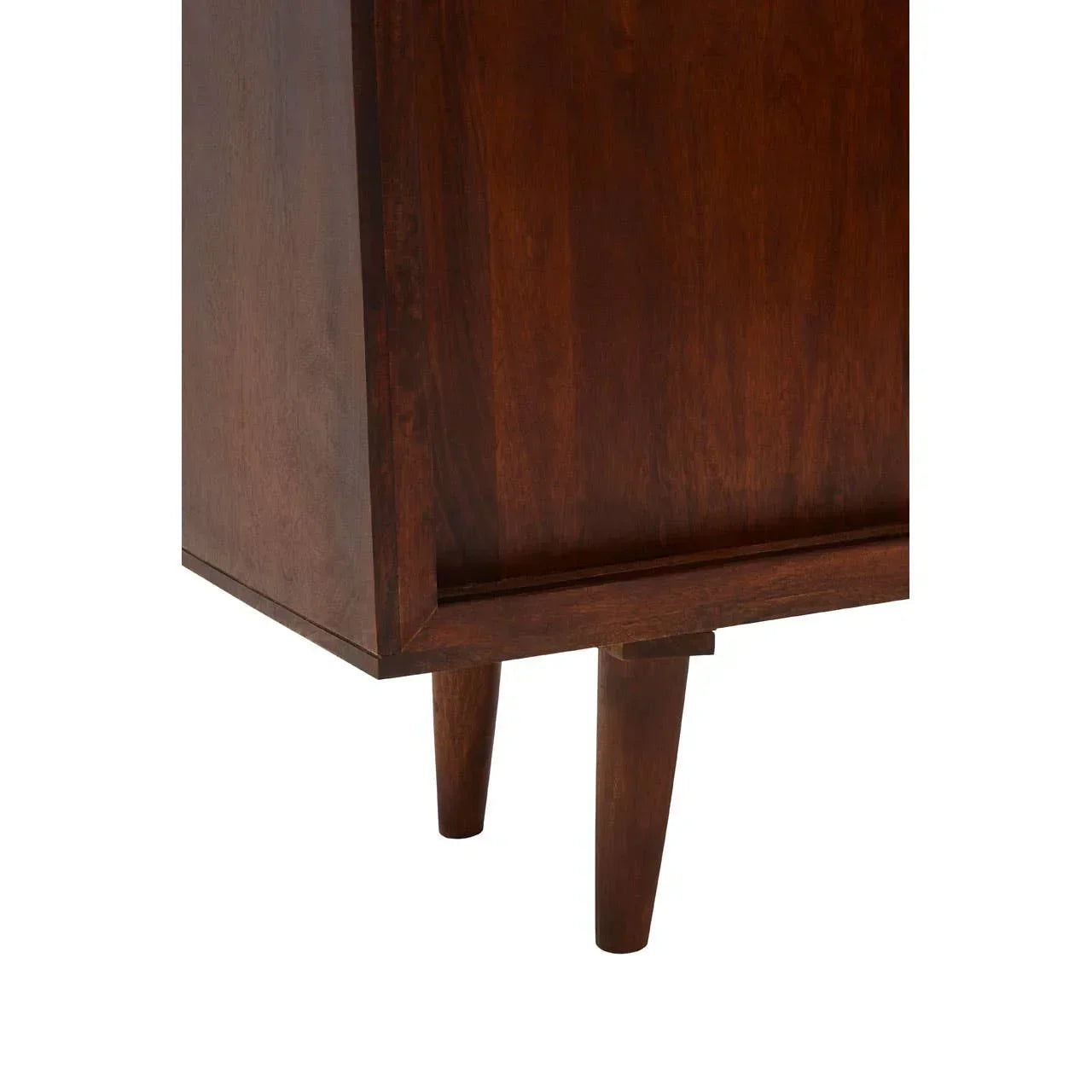Dark wood furniture cabinet corner with angled legs and smooth finish