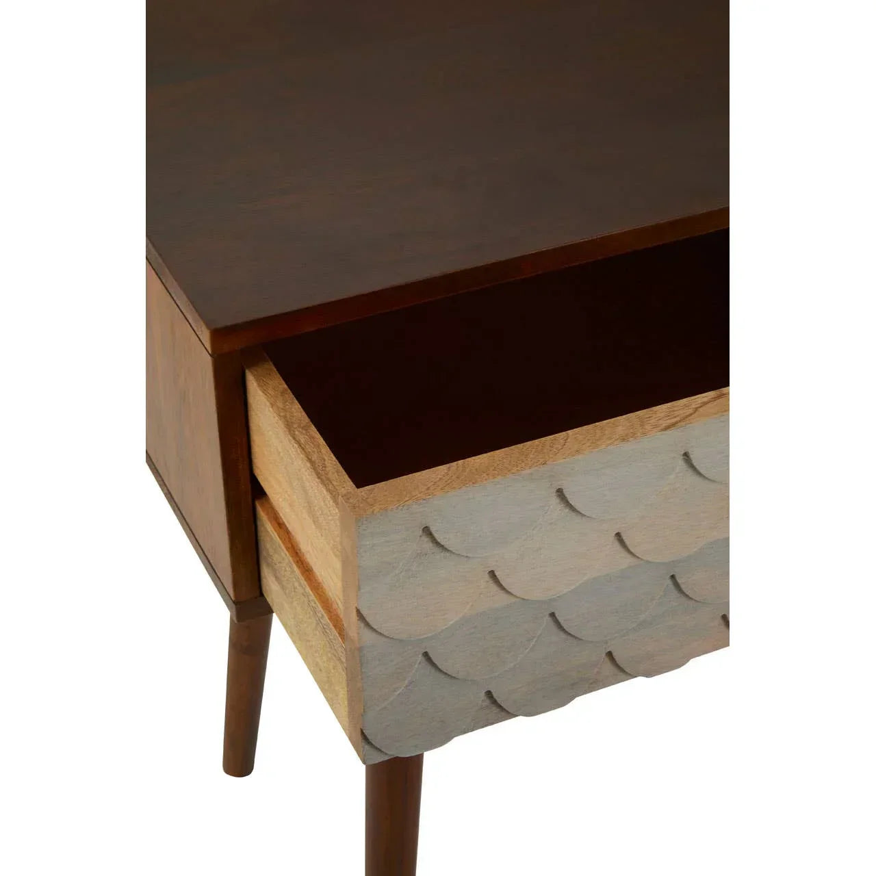 Wooden bedside table with carved drawer front and open drawer, angled view