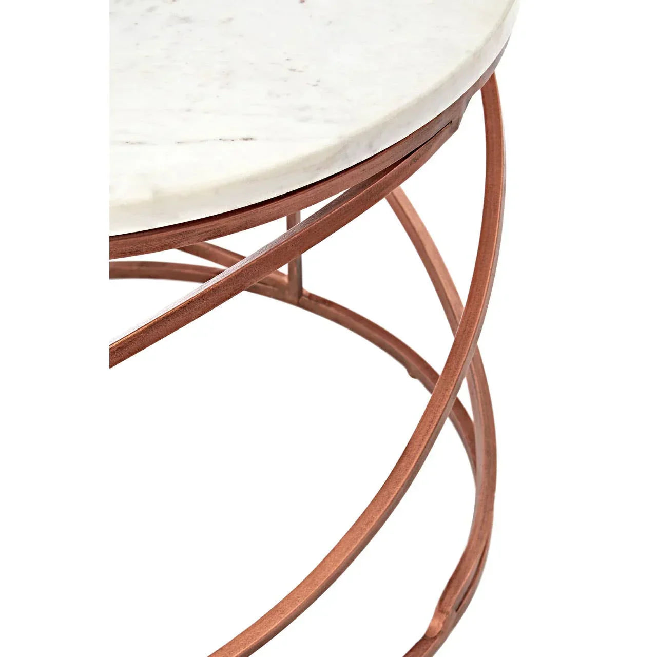 Round marble table top with copper metal base, close-up of frame and surface detail
