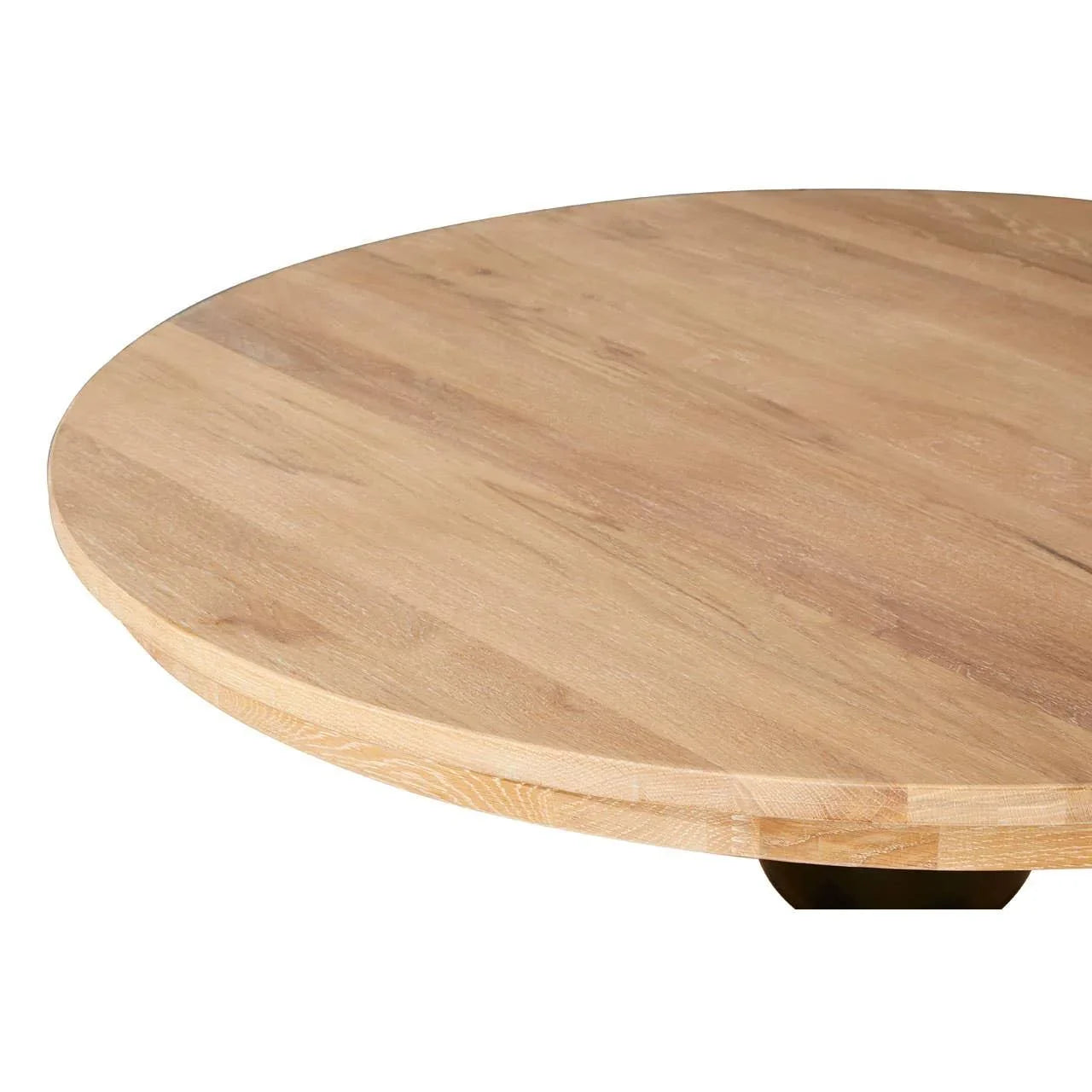 Round oak dining table top with natural wood grain closeup