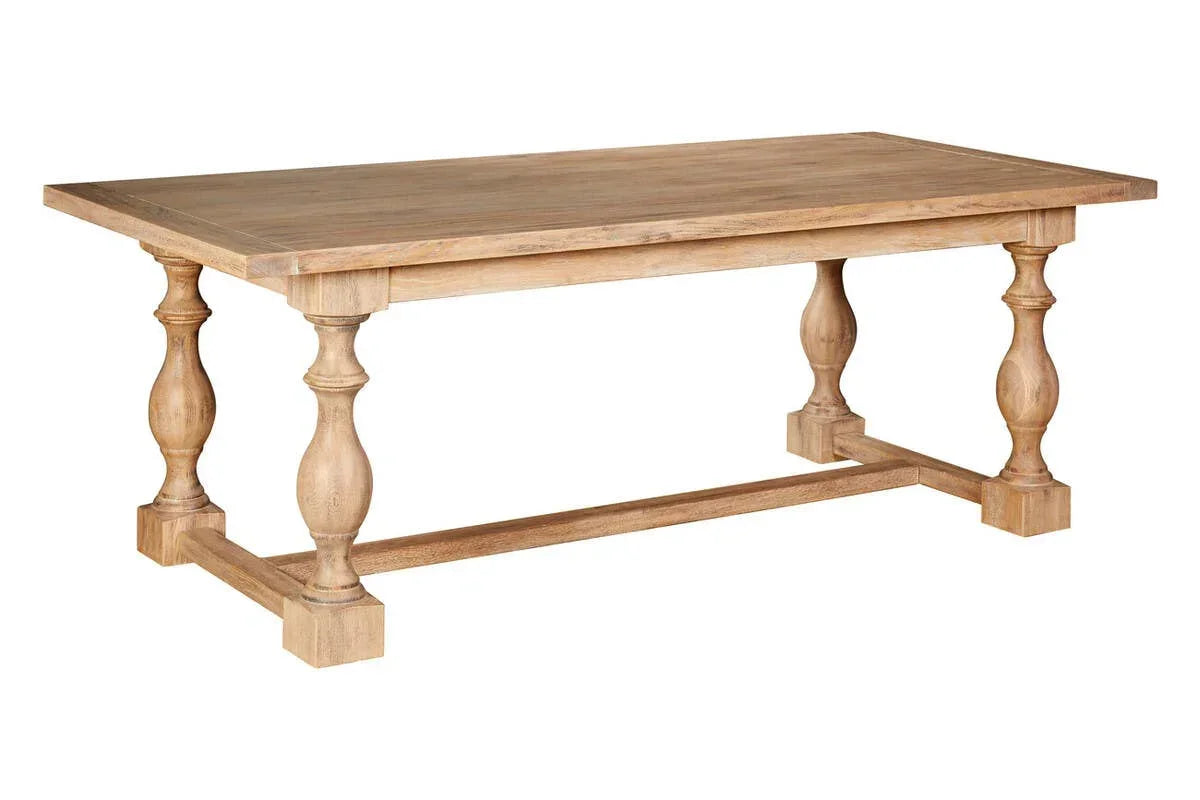 Solid wood dining table with turned legs and rectangular top, natural oak finish, angle view