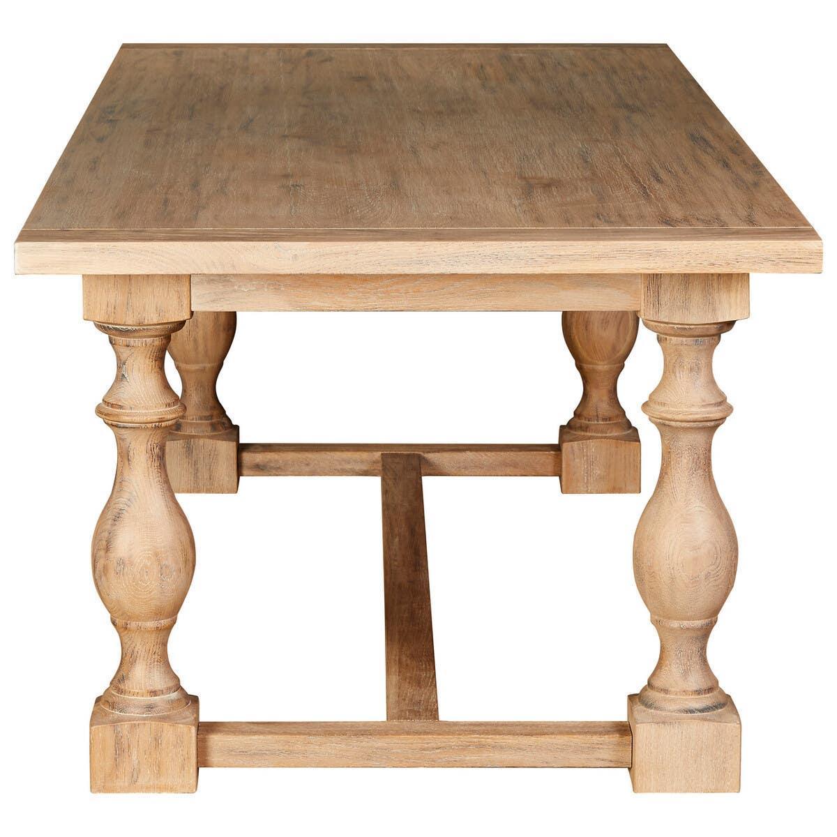 Rectangular oak dining table with carved pedestal legs, front view