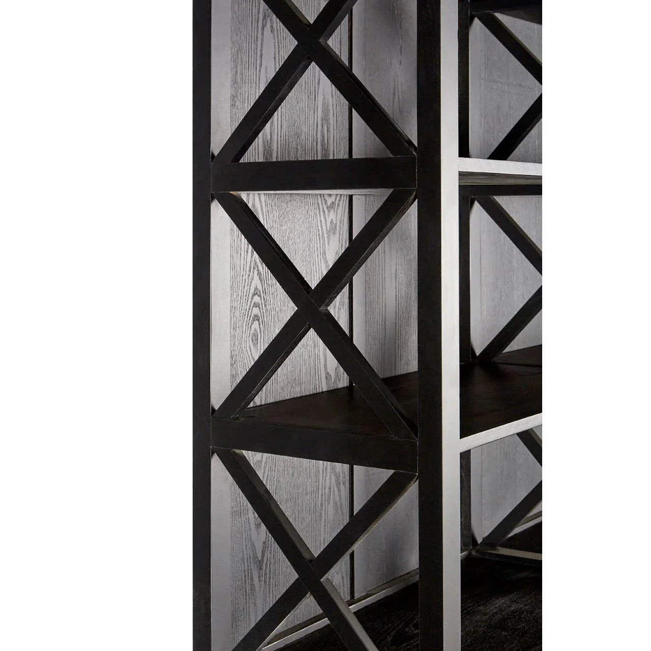 Black metal bookcase with cross-brace detail and dark wood shelves, close side view