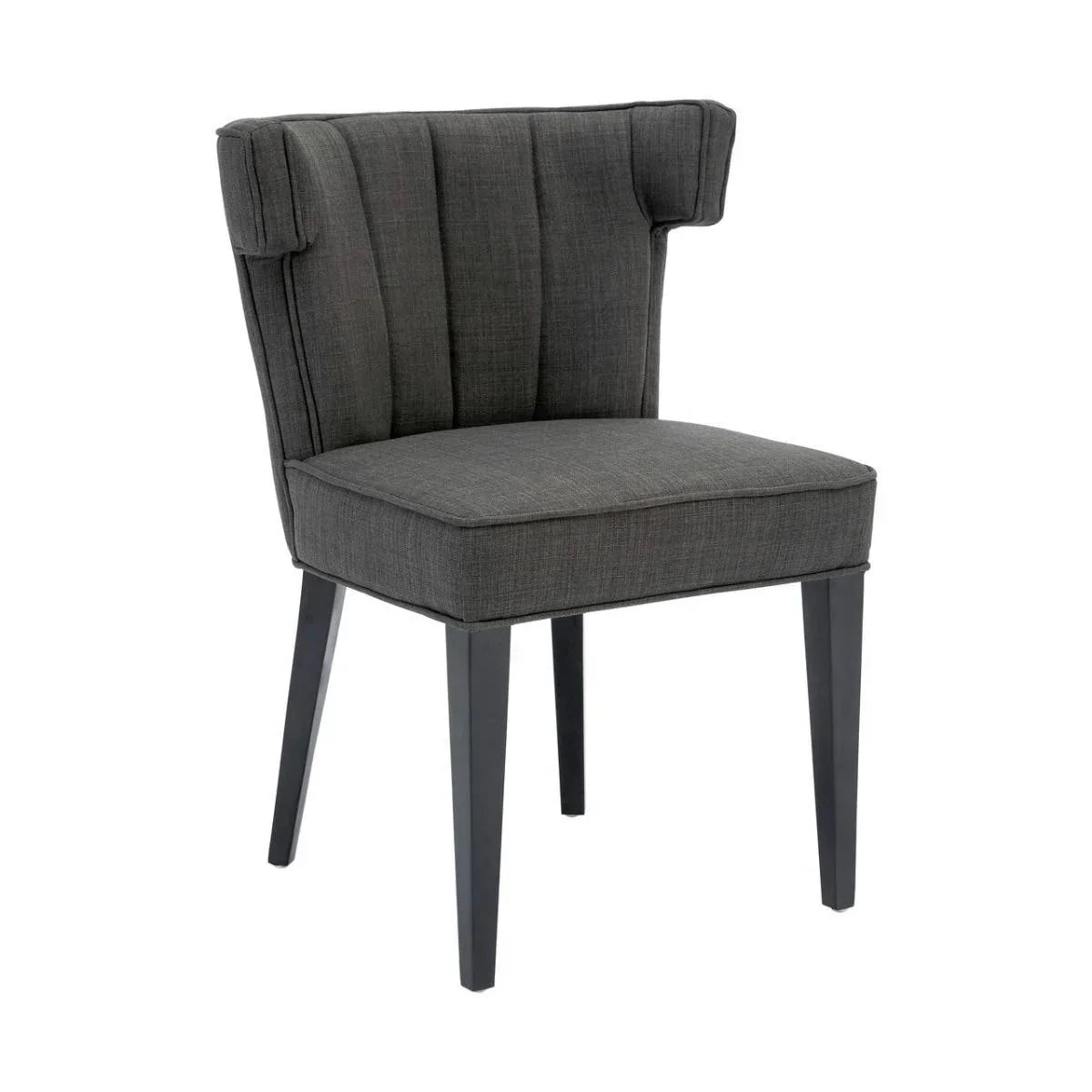 Dark grey fabric dining chair with vertical tufted backrest and black wooden legs