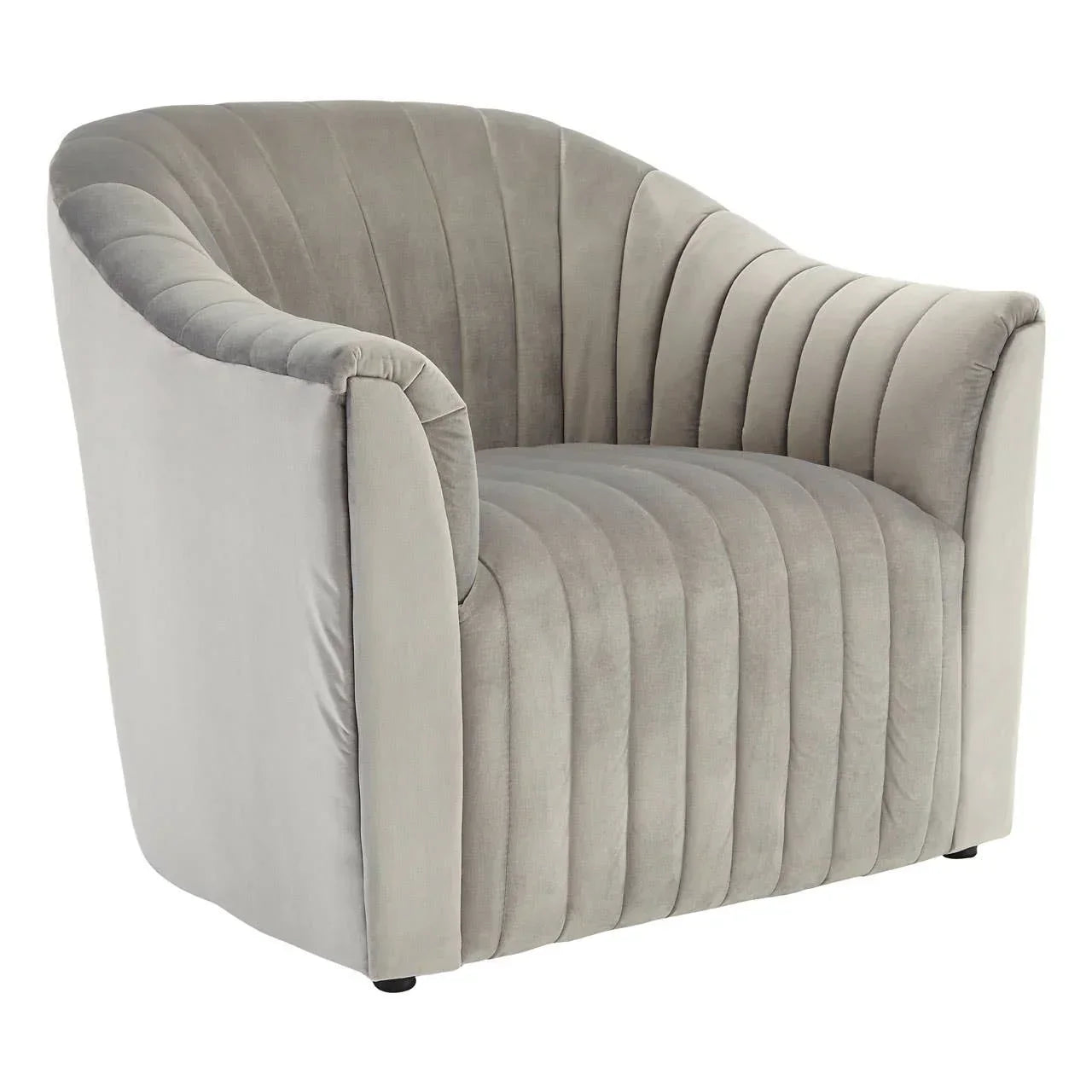 Grey velvet armchair with vertical channel tufting and curved backrest