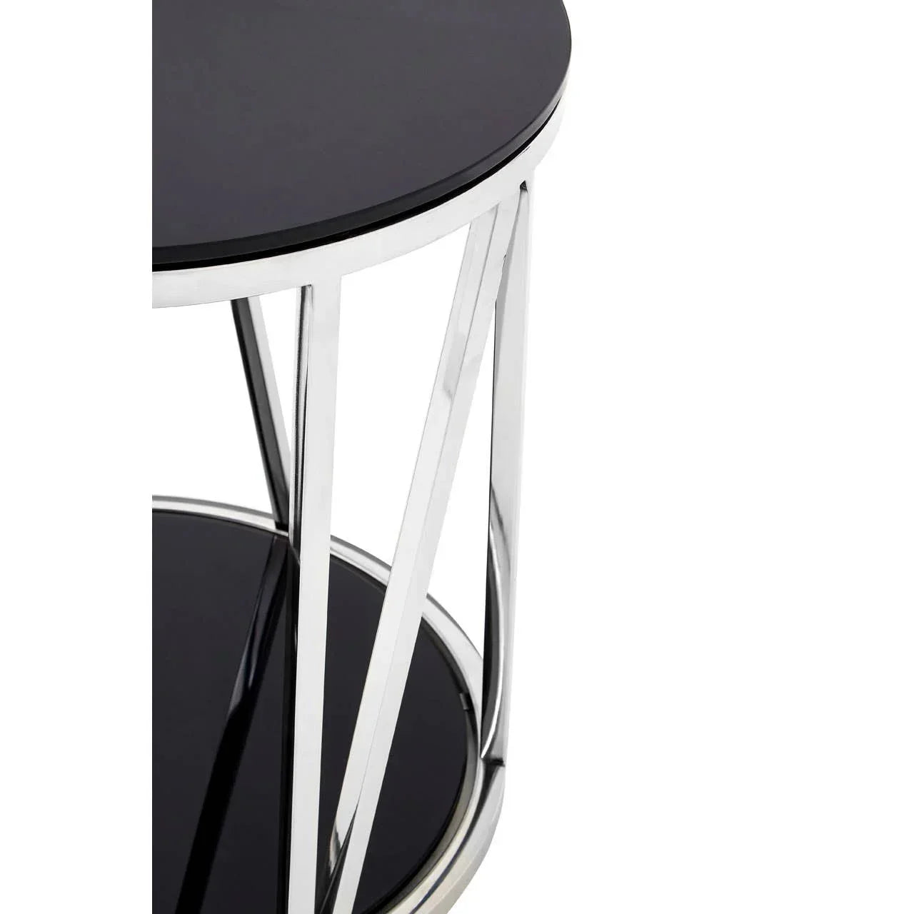 Round black glass side table with chrome metal frame, close-up of top and leg detail