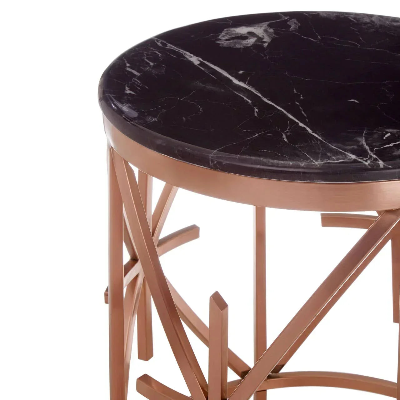 Round black marble side table with rose gold metal legs and geometric base design