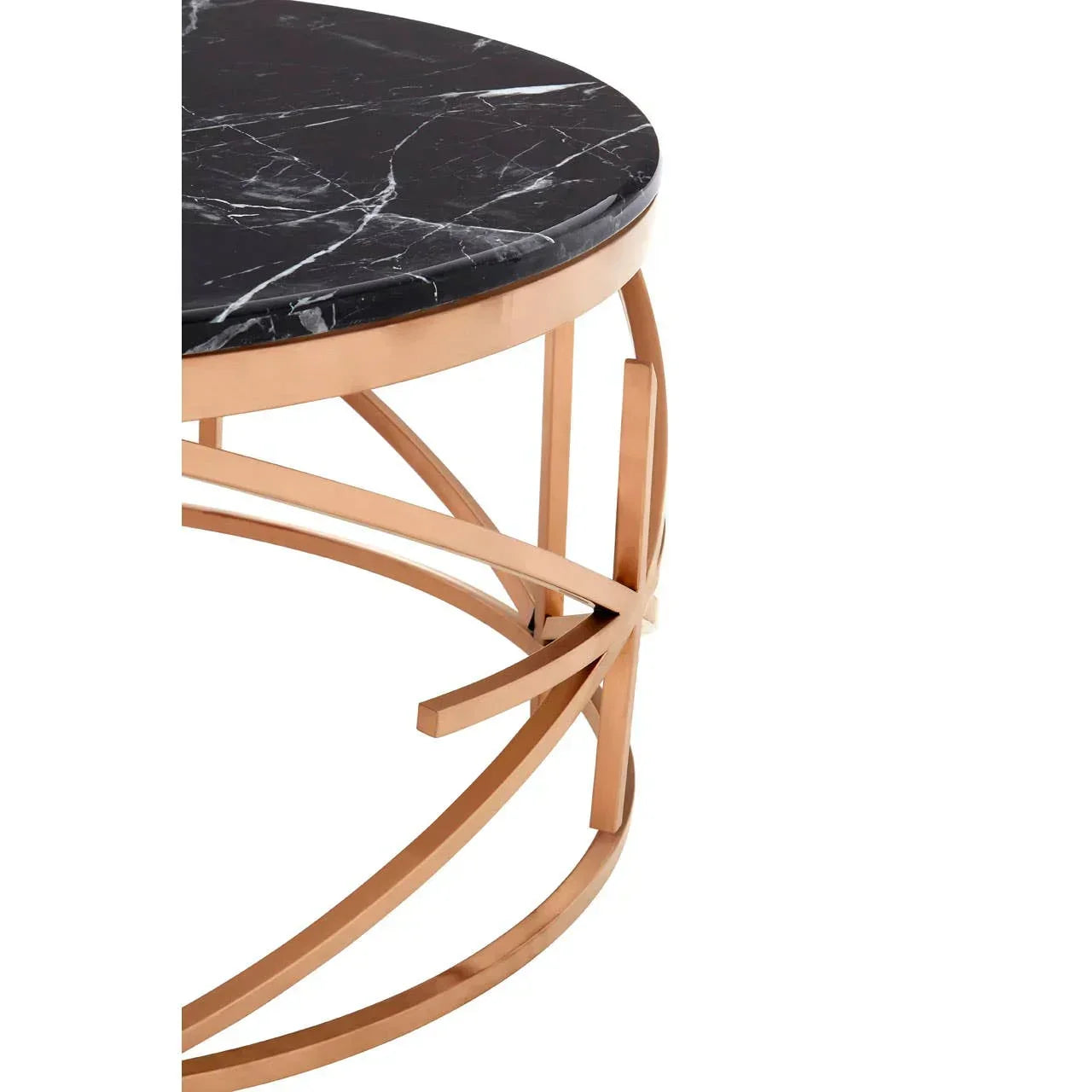Round black marble coffee table with gold metal base, close-up of top and legs