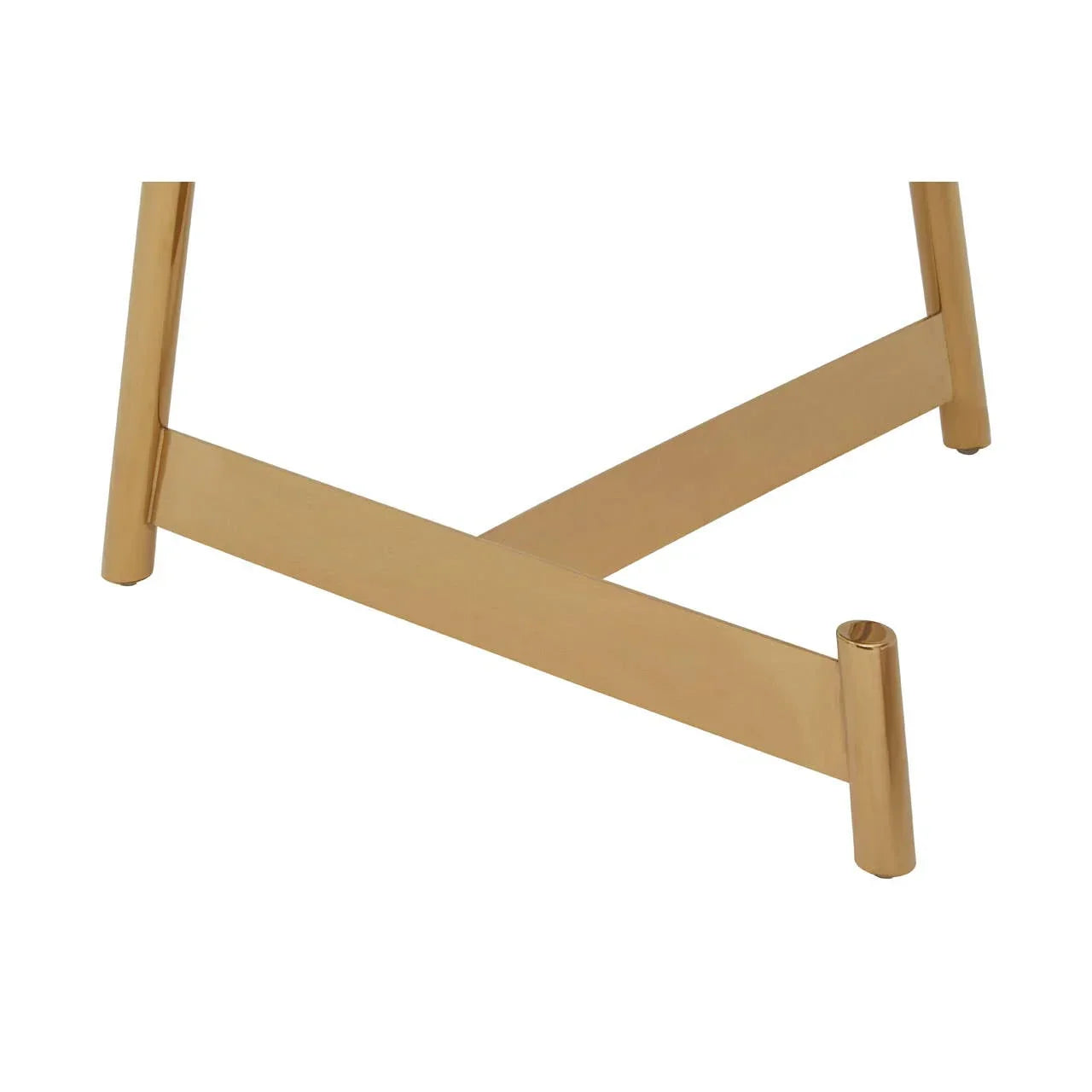 Gold metal table legs with crossbar detail, close-up of modern furniture base