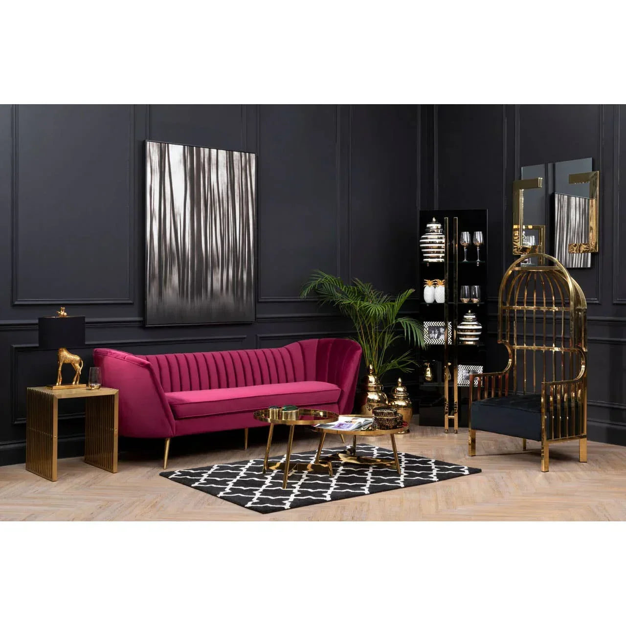Plum velvet sofa with gold legs in modern living room, black walls, gold accent furniture