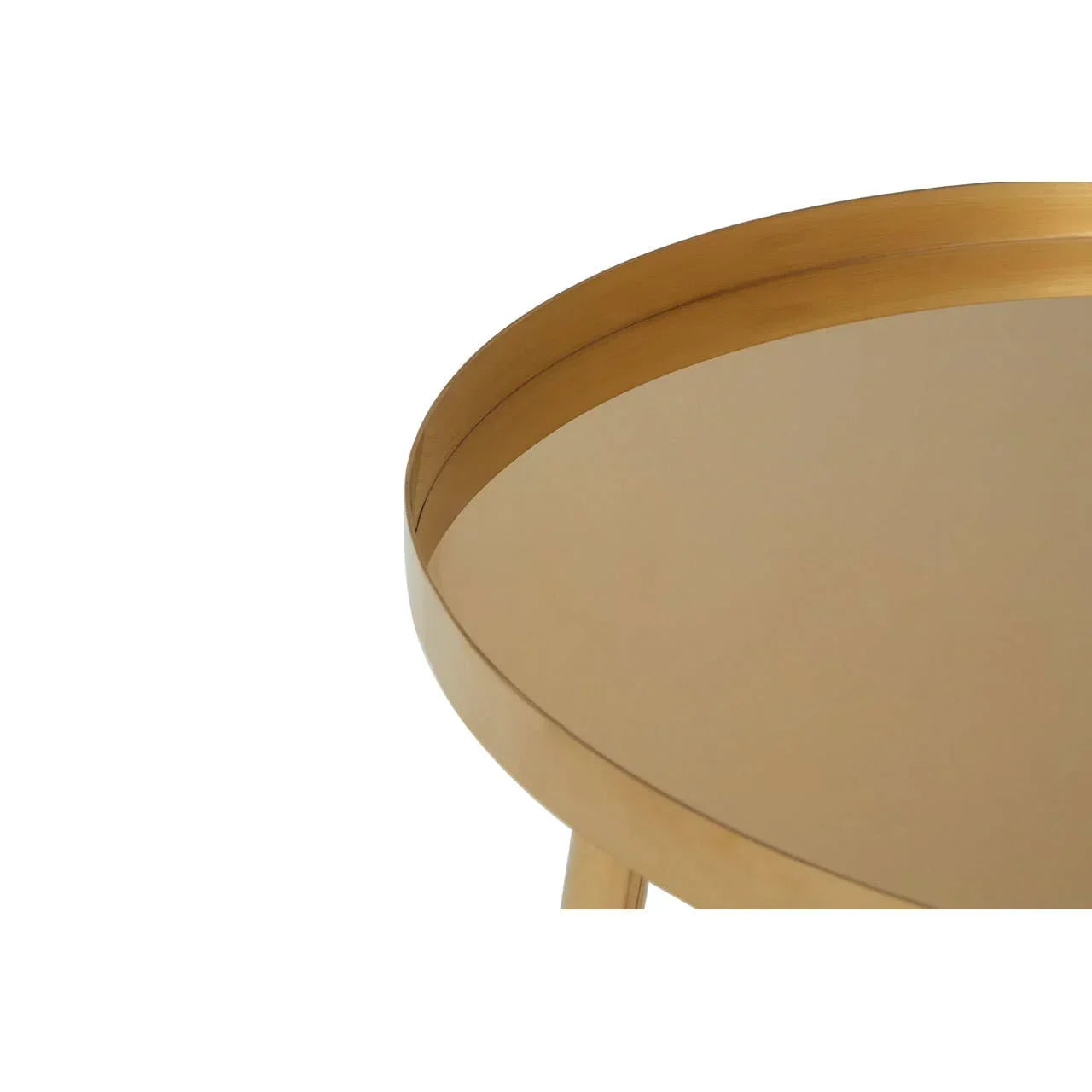 Brass round side table with reflective metal top, close-up of edge and surface