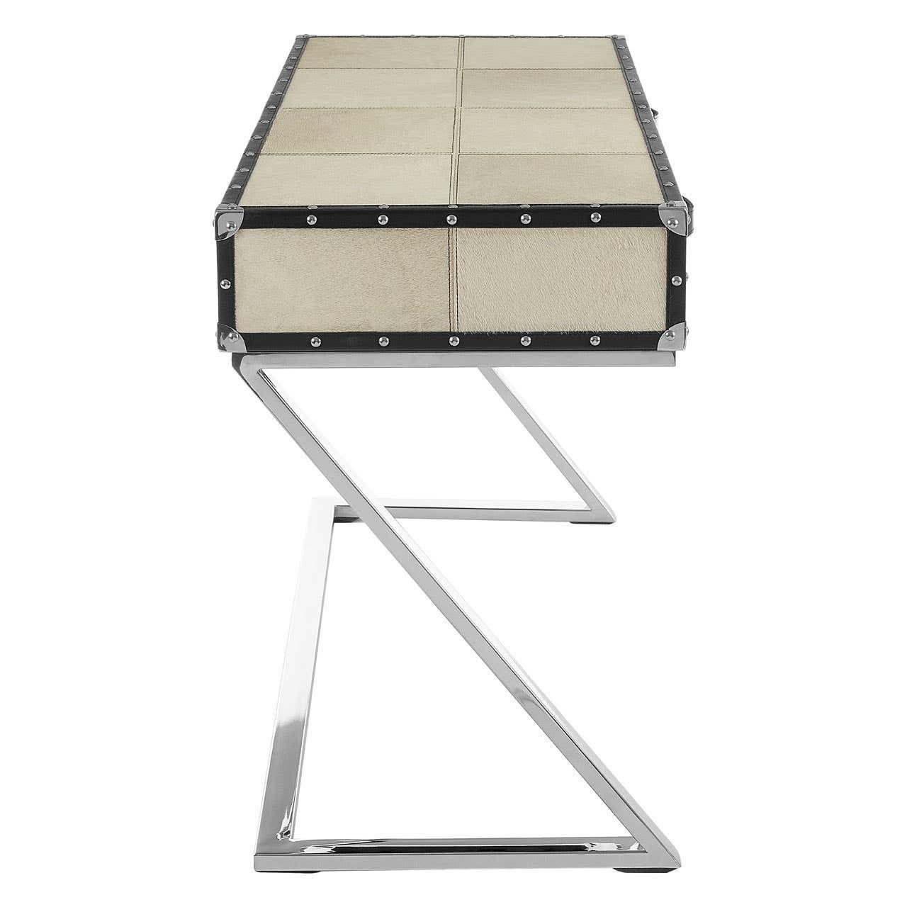 Side view of modern console table with beige panel top and chrome metal zigzag legs