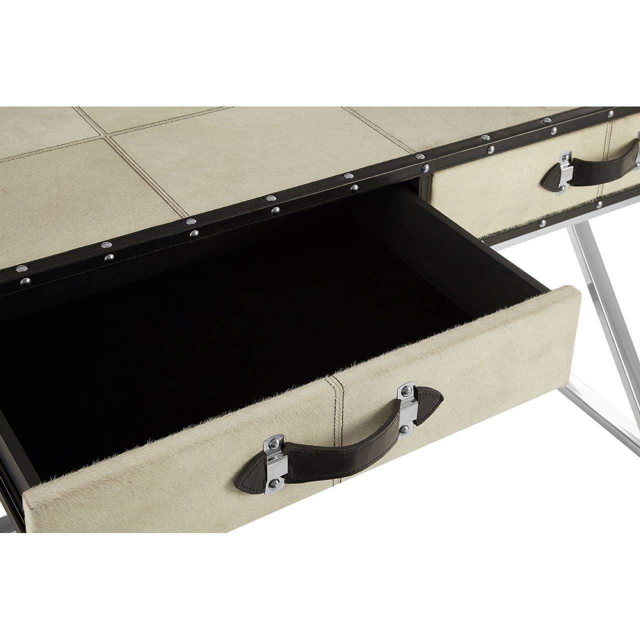 Beige leather desk with open drawer and metal frame, close-up of handle detail