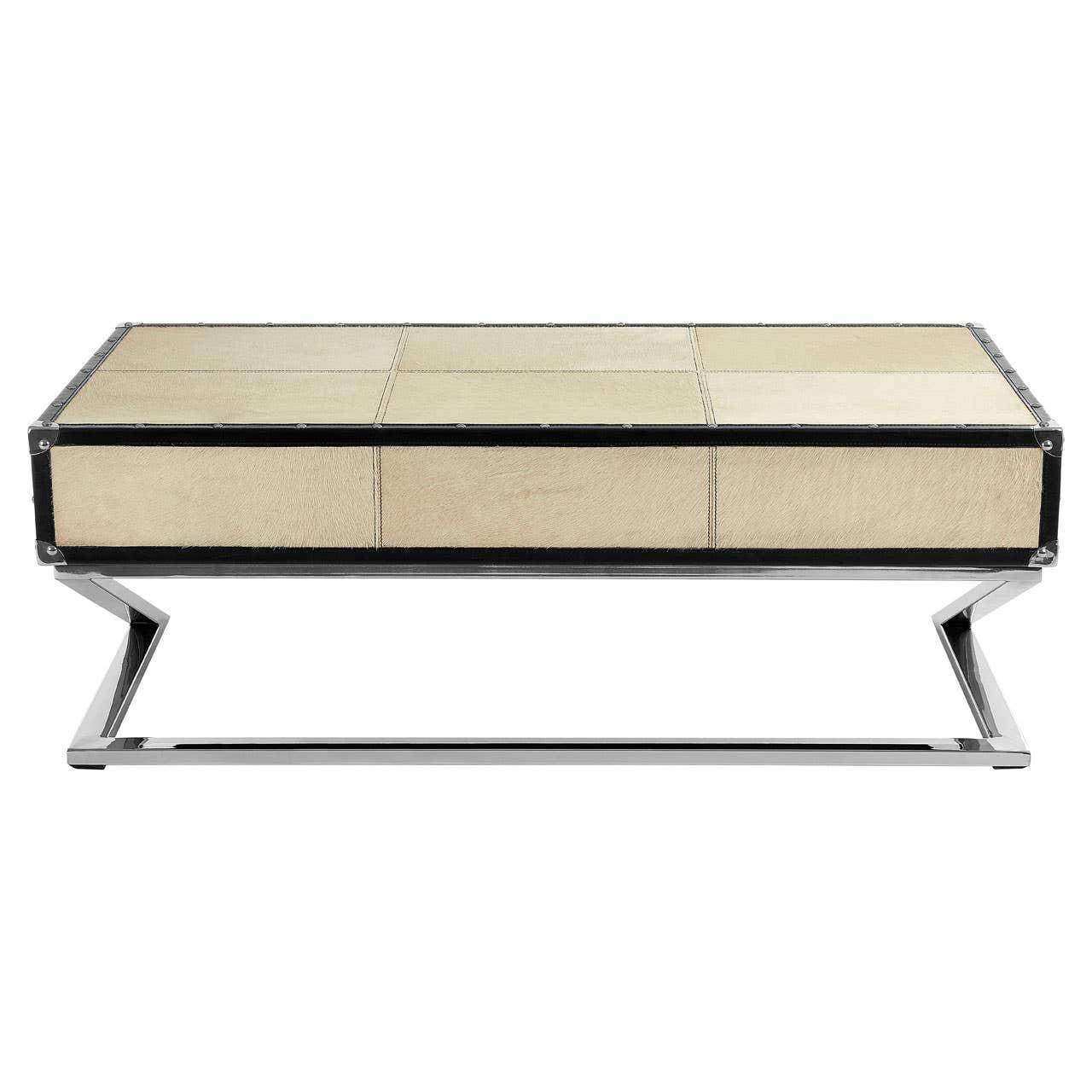 Beige leather coffee table with chrome metal legs and stitched panel design