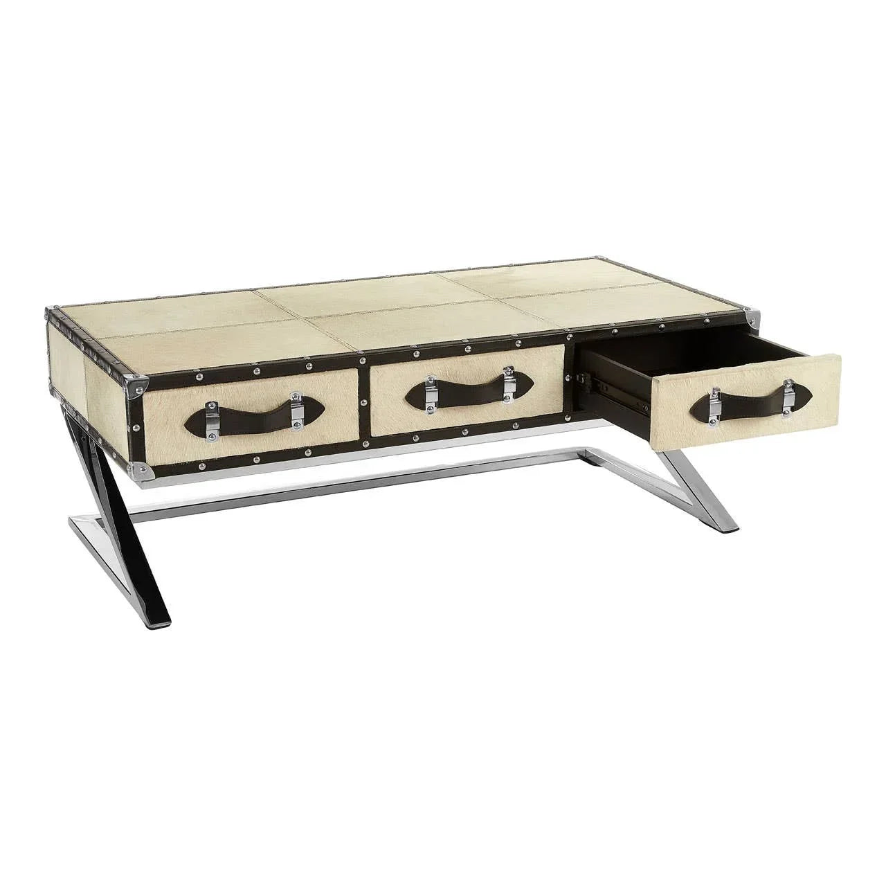Beige trunk style coffee table with metal legs and three front drawers, one open