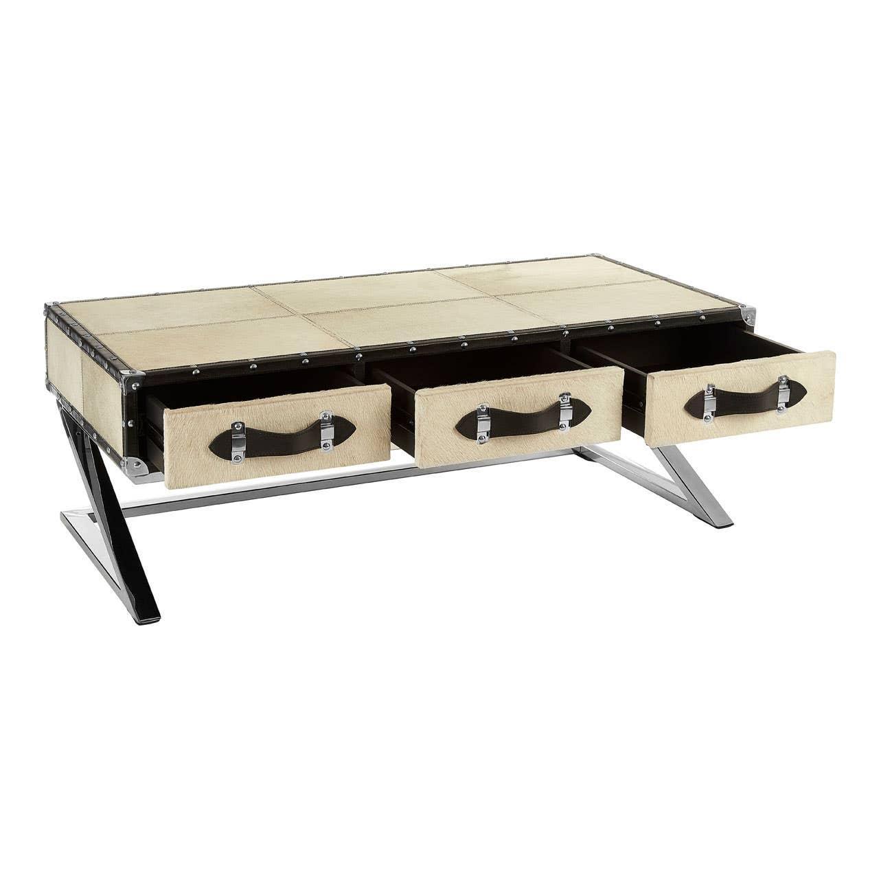Cream coffee table with chrome legs and three front storage drawers, open front view