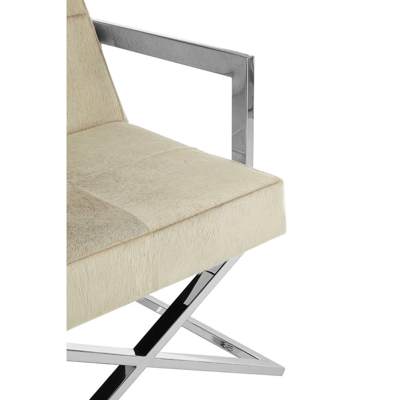Cream upholstered accent chair with chrome metal X-shaped legs and armrest detail