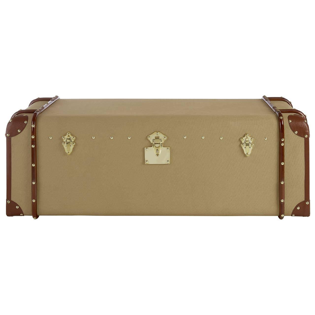 Beige storage trunk with leather trim and brass latches, front view