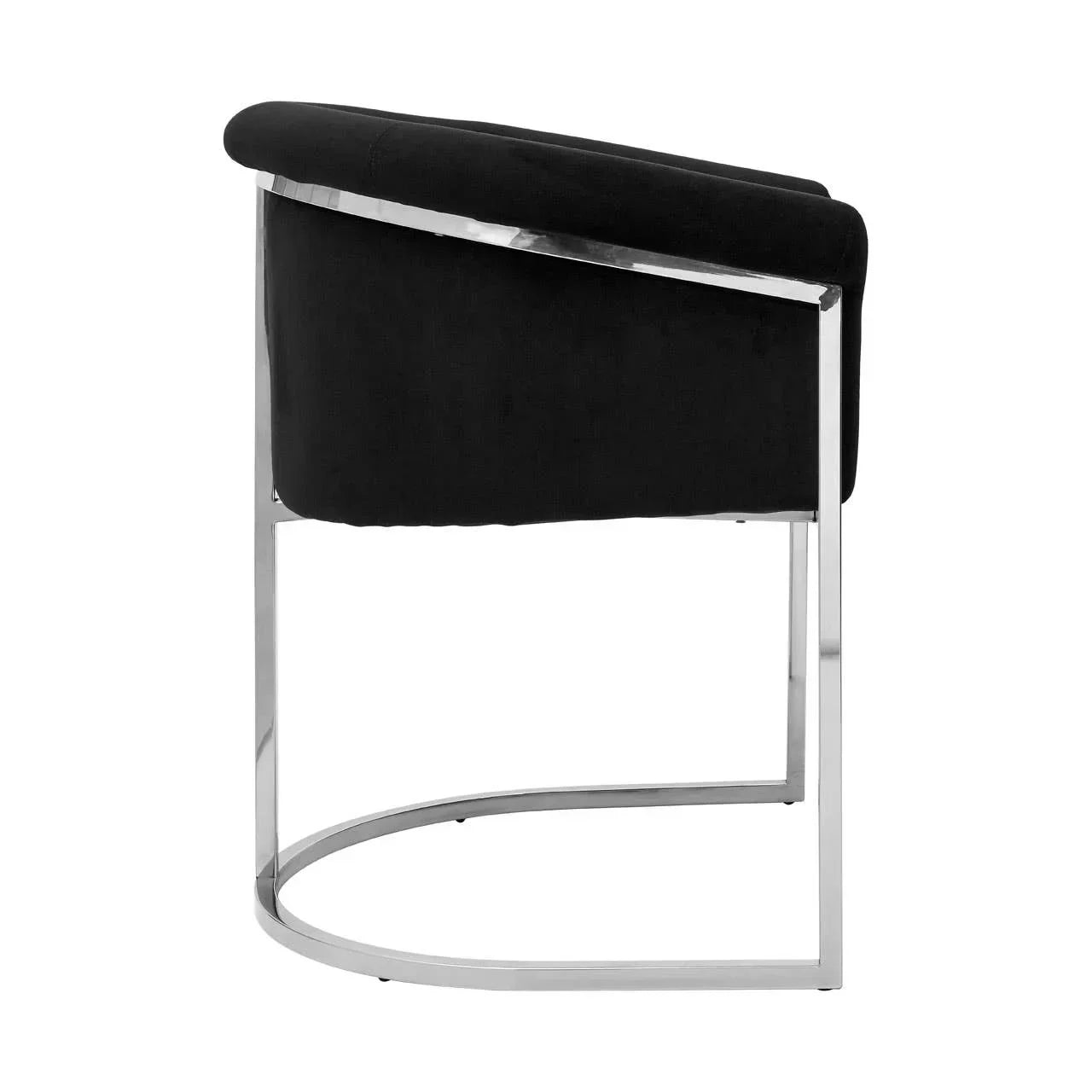Black velvet accent chair with curved chrome frame side view