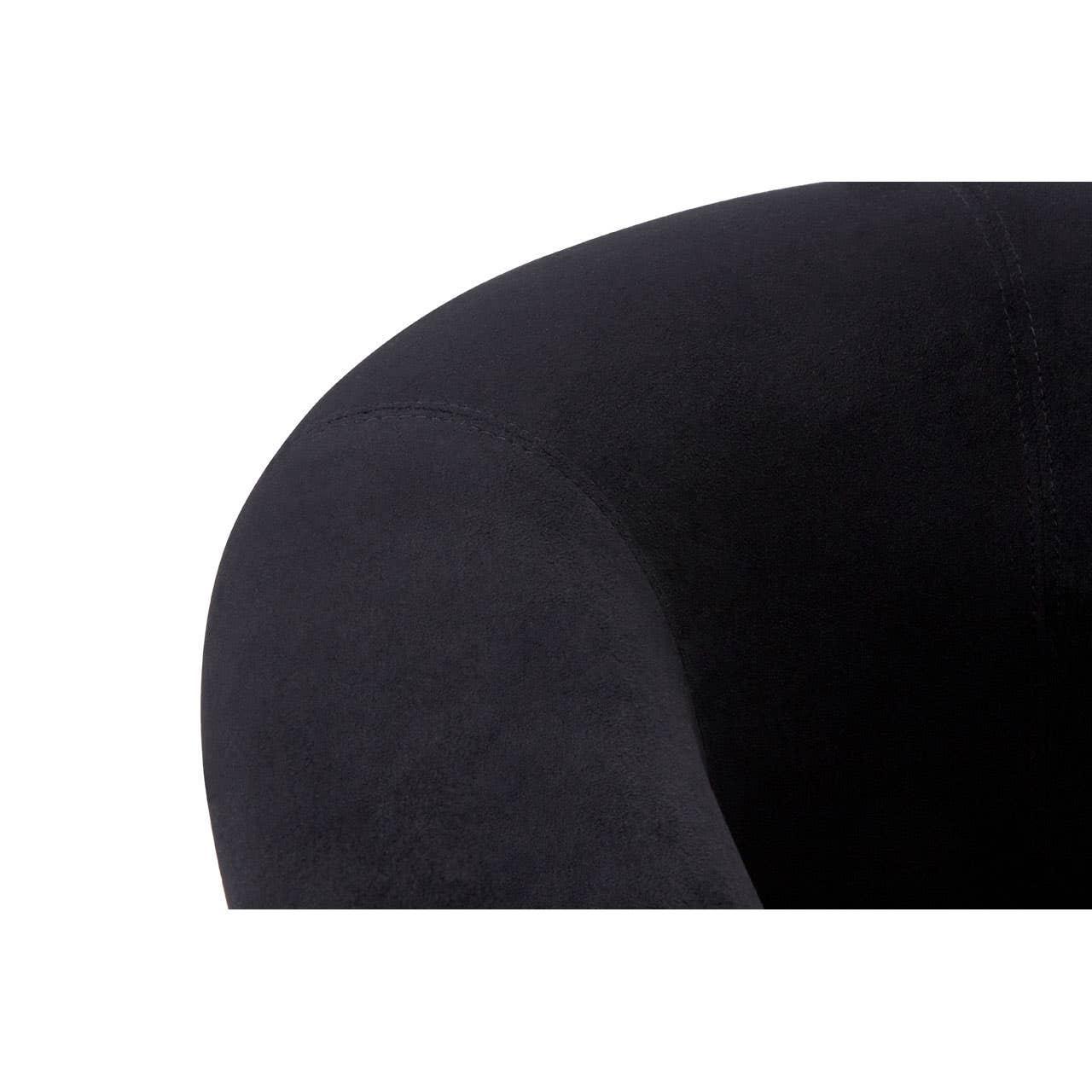 Close-up of black upholstered sofa armrest showing soft fabric texture and stitching detail