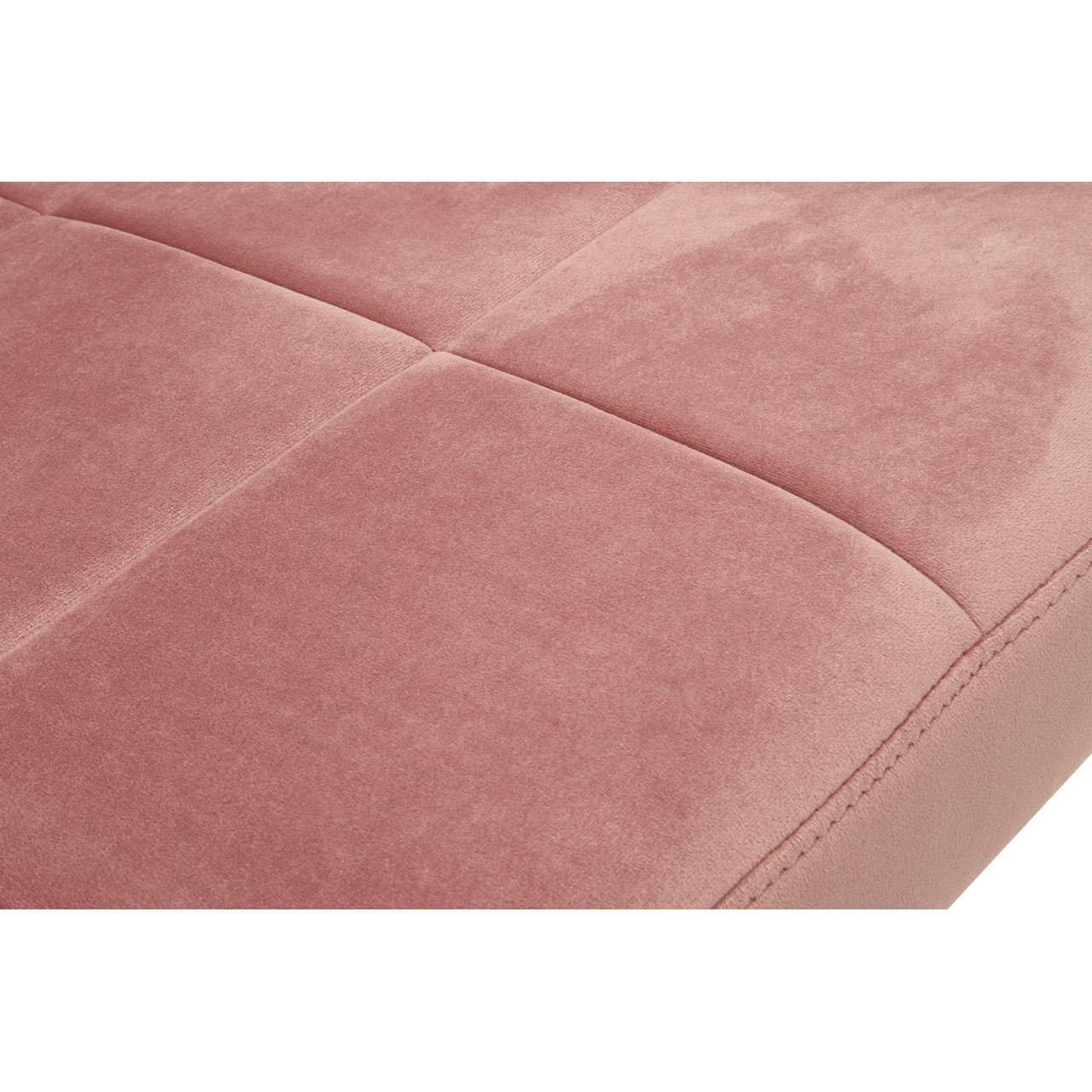 Close up of pink upholstered sofa cushion with square stitched detail