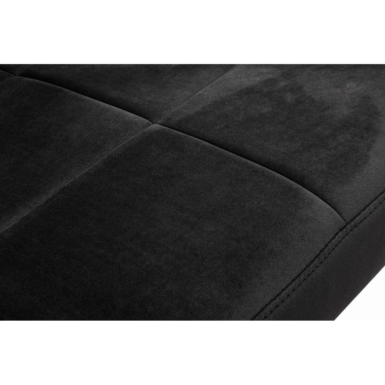 Closeup of black upholstered sofa cushion with square tufted stitching detail
