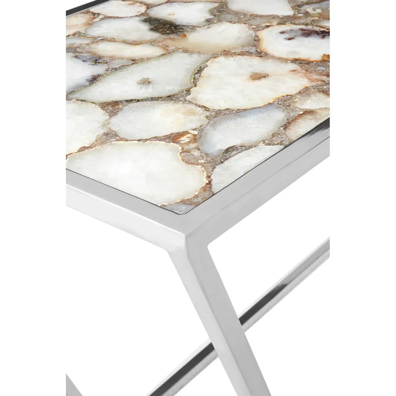 Stone top side table with polished metal frame and geometric legs, close-up angle
