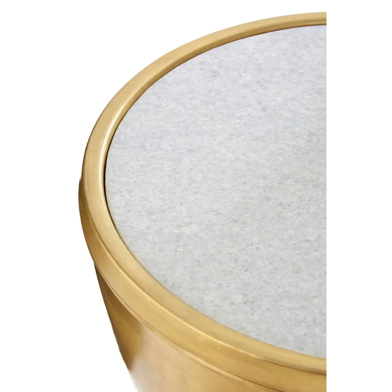 Round side table with white marble top and gold metal rim, close-up of surface