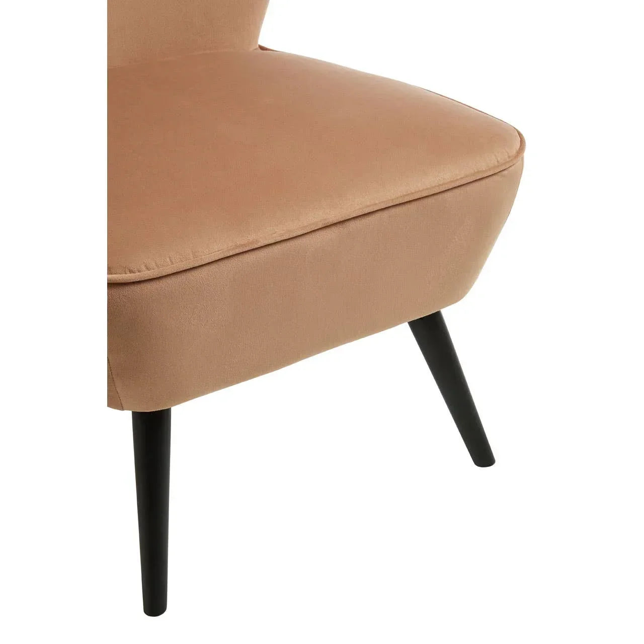 Beige upholstered accent chair seat with black tapered legs, close-up side angle