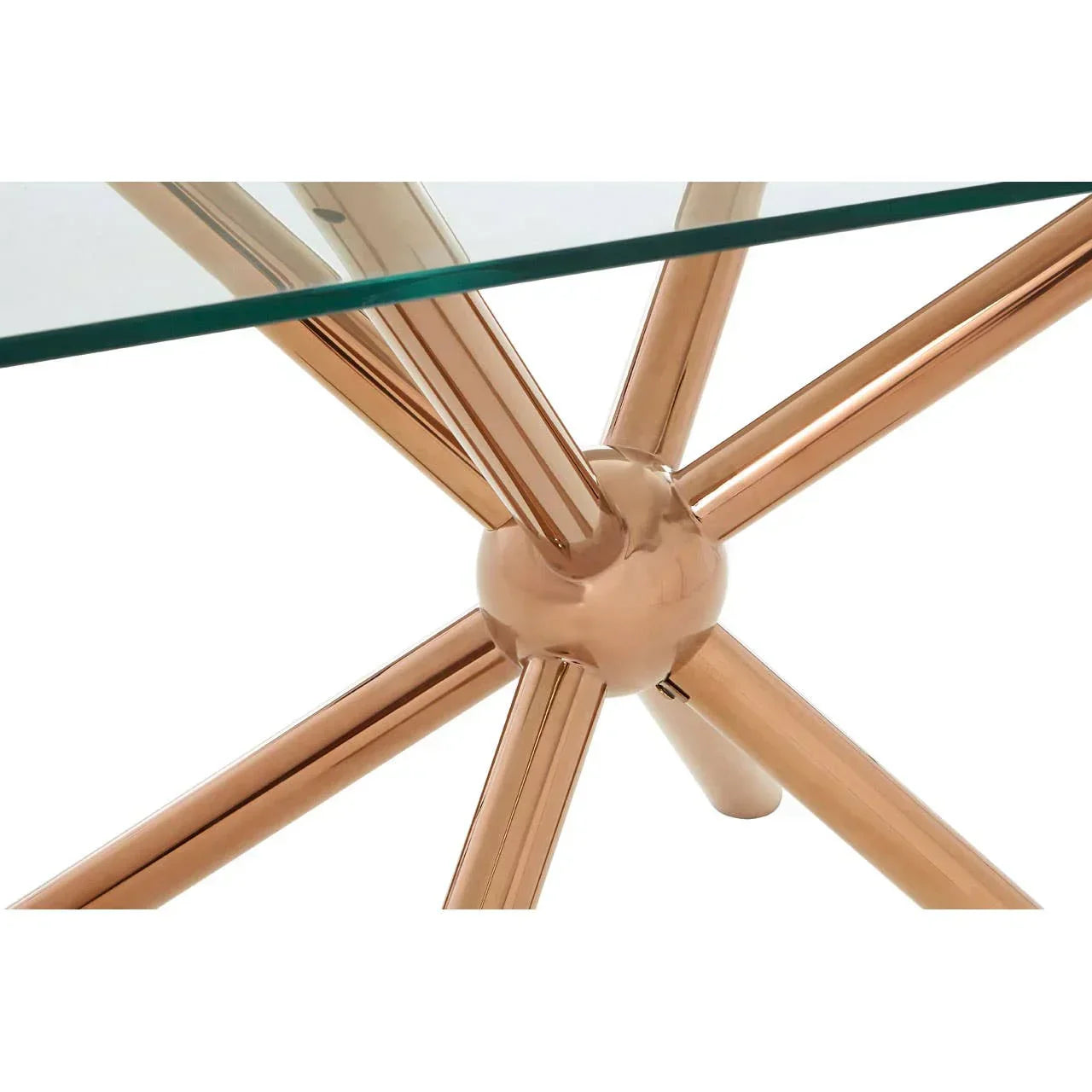 Glass coffee table with gold metal legs in geometric design, close up of base and top