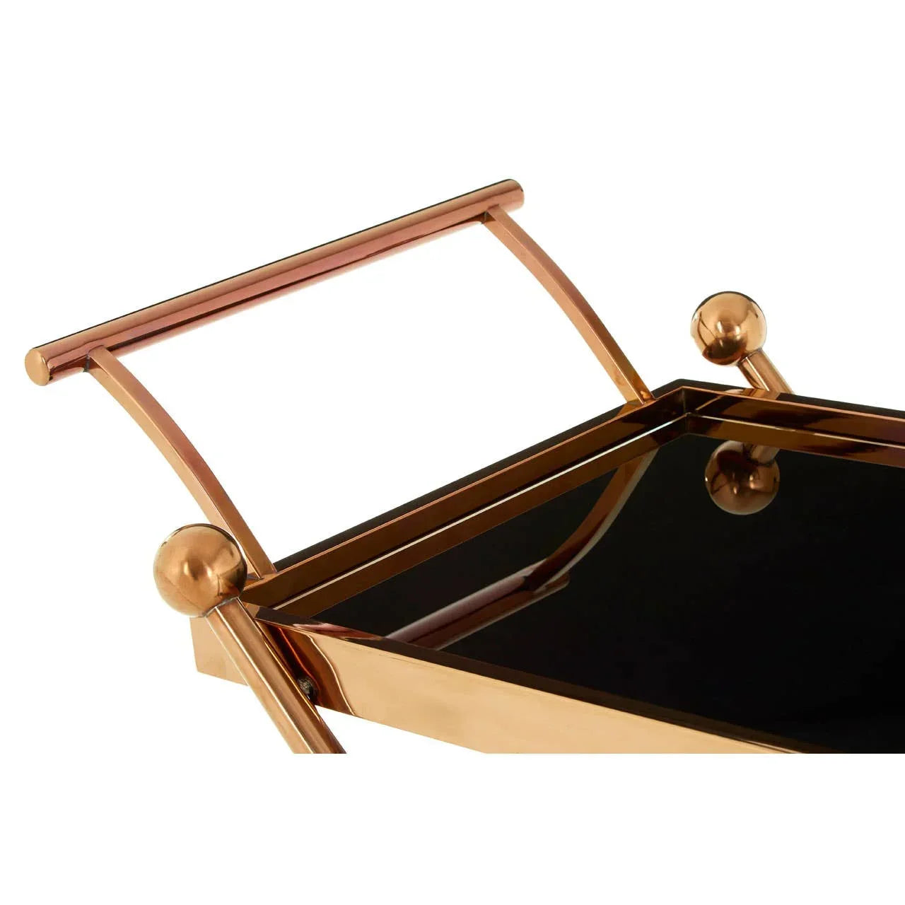 Gold metal serving tray with black glass base and curved handle detail